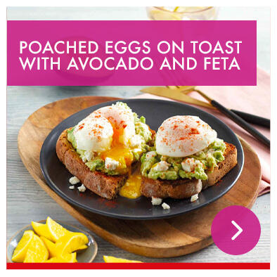 Poached eggs on toast with avocado and feta